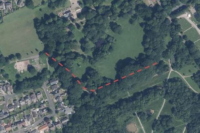 The proposed route of the trim trail in red.