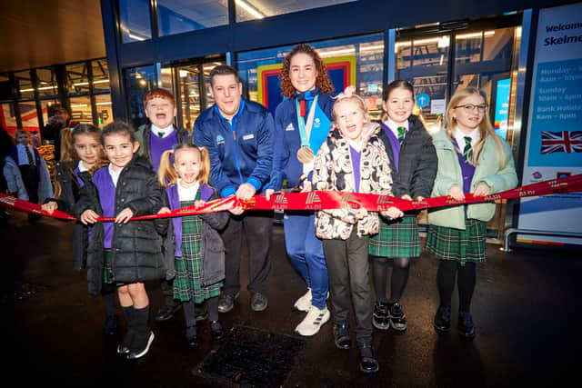 The Aldi Skelmersdale grand opening featuring store manager Ian Varden, Team GB athlete Laura Deas and Brookfield Park Primary School.