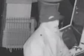 Do you recognise this man? He is wanted in connection with a burglary at the Golden Cross pub in Preston (Credit: Lancashire Police)