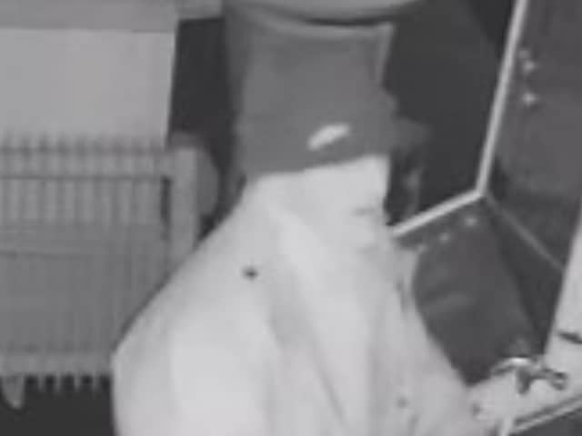 Do you recognise this man? He is wanted in connection with a burglary at the Golden Cross pub in Preston (Credit: Lancashire Police)