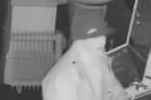 Do you recognise this man? He is wanted in connection with a burglary at the Golden Cross pub in Preston (Credit: Lancashire Police)