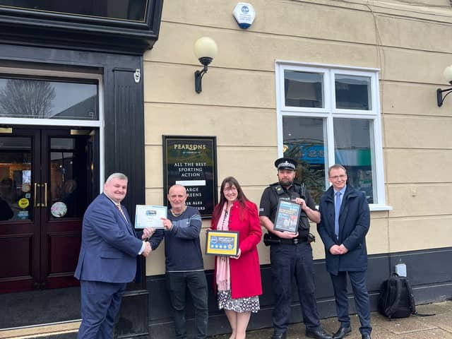 Chorley Council, Lancashire Police, representative for the Police and Crime Commissioner and Licensing SAVI members present Chorley venues with awards.