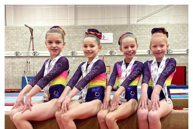 Some of the gymnasts that are excited to be going to Orlando to compete. 