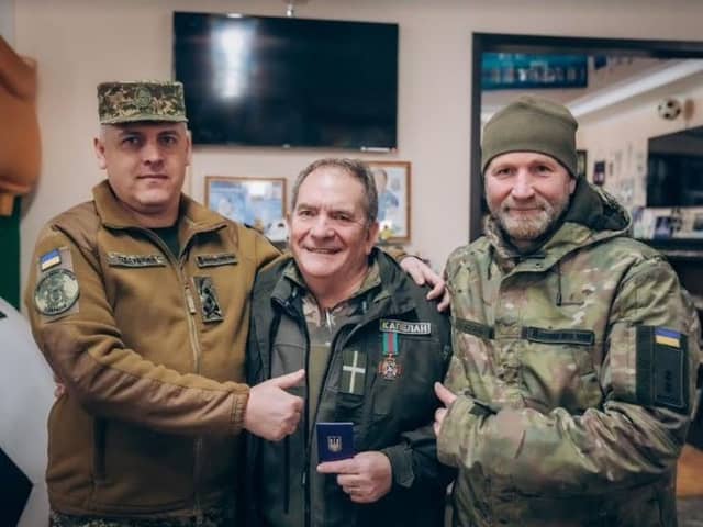 Bernard (centre) met with General Oleg Pidlubny and Colonel Sergei Sudets of the National Guard.