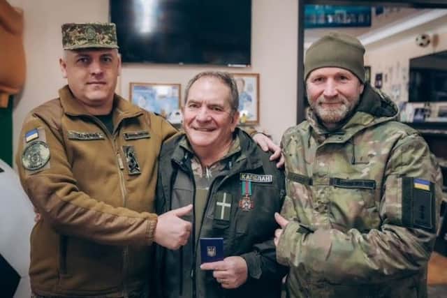 Bernard (centre) met with General Oleg Pidlubny and Colonel Sergei Sudets of the National Guard.