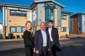 L to R: Greater Lancashire Hospital’s operations director Sara Rajiah, executive chairman Gwam Rajiah and director of investment and development Myles Rajiah, pictured in front of the company headquarters in Ribbleton, Preston.