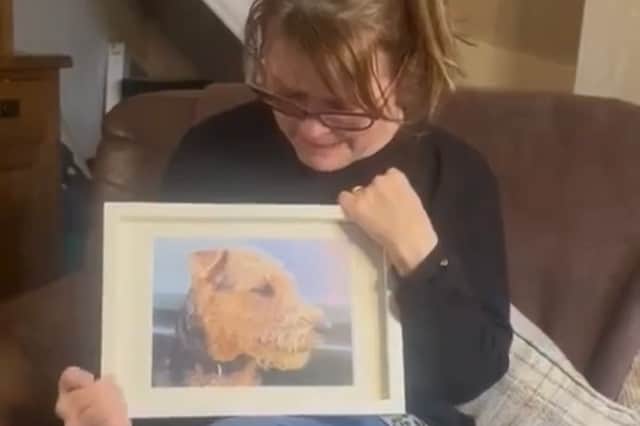 Catherine Bamber with a picture of Bear.