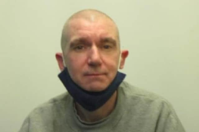 Jon O’Brien is wanted on recall to prison (Credit: Lancashire Police)