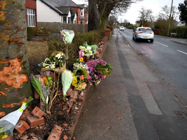 Flowers left at the scene of a fatal crash in Hesketh Lane, Tarleton, where a 50-year-old man and a 17-month-old girl were killed on Sunday morning (February 4)