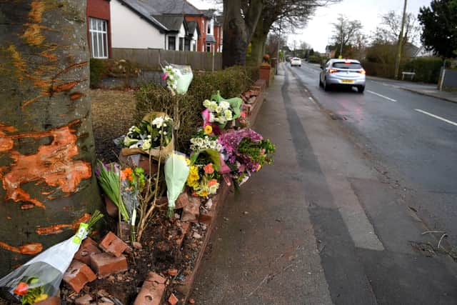 Flowers left at the scene of a fatal crash in Hesketh Lane, Tarleton, where a 50-year-old man and a baby girl, aged 17 months, were killed on Sunday morning (February 4)