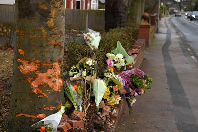 Flowers and cards in tribute to David Beckett and his 17-month-old daughter have been left at the scene of the crash which killed the pair on Sunday morning (February 4)