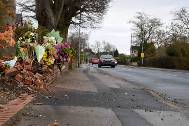 Flowers and cards in tribute to David Beckett and his 17-month-old daughter at the scene of the crash which killed the pair on Sunday morning (February 4)