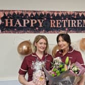 Cathy Corcoran (left) presents retirement gifts to Louise Newson, her colleague in the NHS Lancashire Bowel Screening Programme, based at Blackpool 