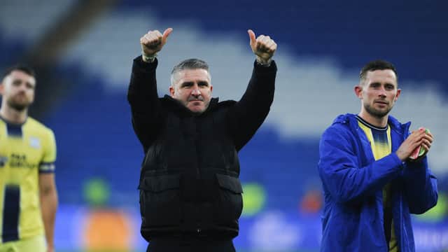 Preston North End manager Ryan Lowe applauds the fans at the final whistle 