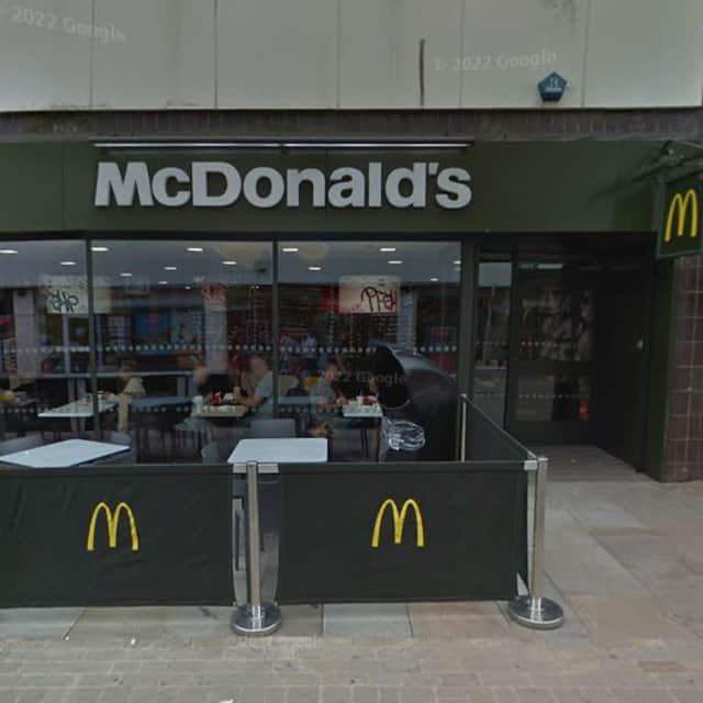 The man in his 30s had been found unresponsive outside McDonald's on King William Street in Blackburn earlier this morning (Tuesday).