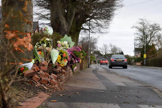 Flowers in tribute to David Beckett and his 17-month-old daughter Darcy at the scene of the fatal crash in Hesketh Lane, Tarleton on Sunday, February 4