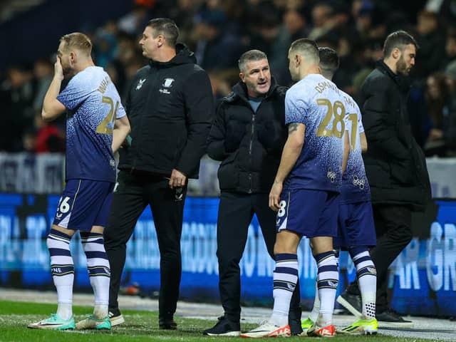 Preston North End manager Ryan Lowe gives instructions to his substitutes
