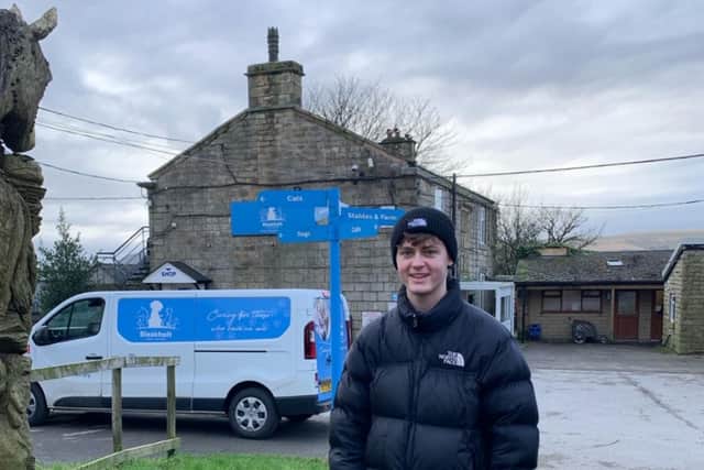Oliver stood outside Bleakholt Animal Sanctuary, the charity he will be fundraising for. 