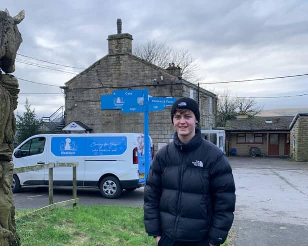 Oliver stood outside Bleakholt Animal Sanctuary, the charity he will be fundraising for. 