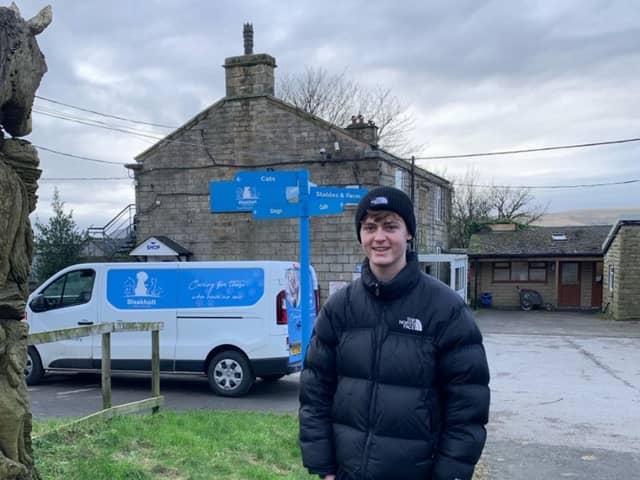 Oliver stood outside Bleakholt Animal Sanctuary, the charity he will be fundraising for. 
