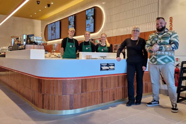 Meet the Starbucks family. Kat Jakielska (store manager), Matt Lawson (district manager), and barristas Egle Bidvaite, Phoebe Parr and Emily Gardner.