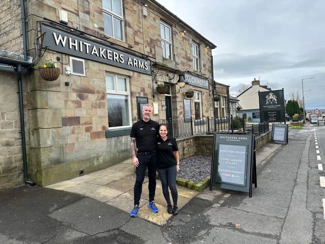 Licensees, Vanessa and Jamie Wolfenden outside their newly refurbished pub, The Whitaker's Arms.