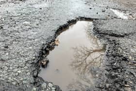 A pothole in Green Lane, Whitestake