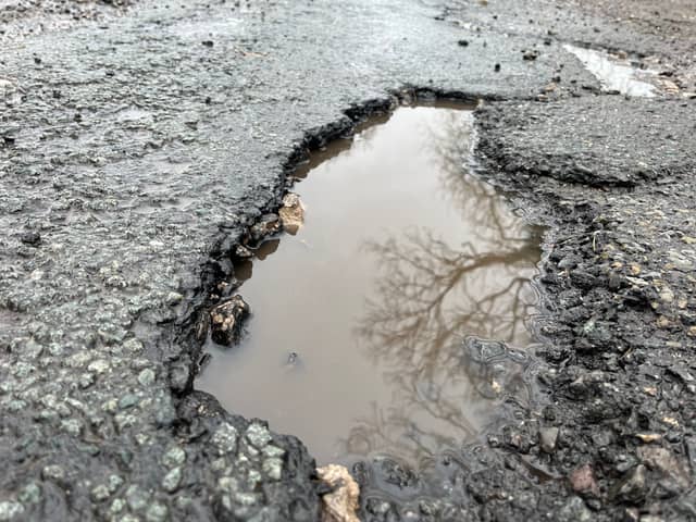 A pothole in Green Lane, Whitestake