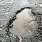 A pothole in Green Lane, Whitestake
