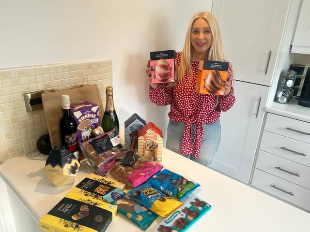 Digital reporter Emma Downey pictured with the Aldi Easter box treats. 