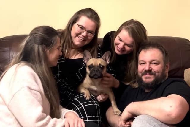The Kowalczyks reunited with their beloved dog, Tina.