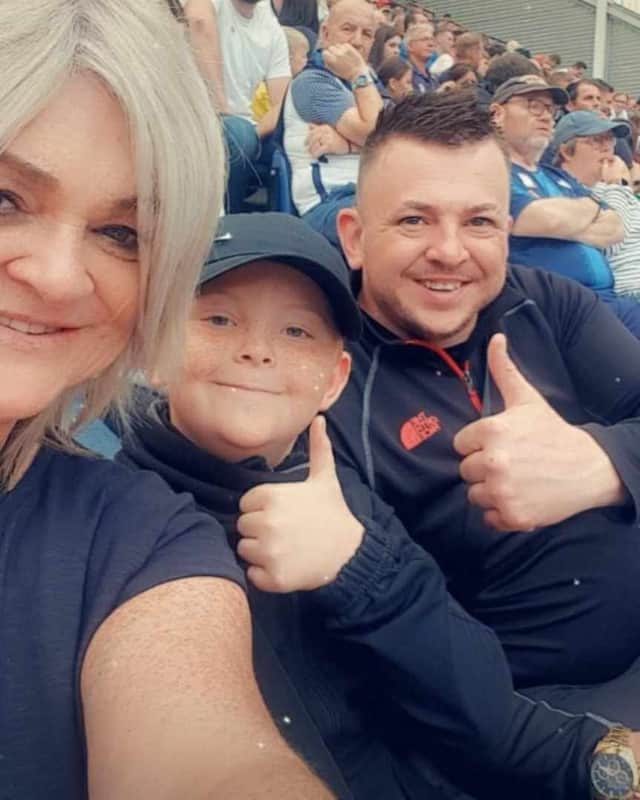 Preston North End supporters have suggested clapping on the 11th minute of the club's next home again in honour of 11-year-old fan Tommie-lee (pictured at Deepdale with his dad and grandmother) who tragically died last weekend
