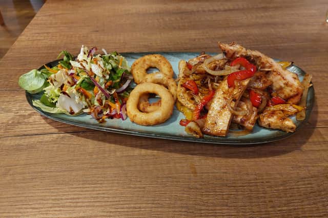 The chicken teriyaki which same with salad, onion rings and sautéed vegetables.