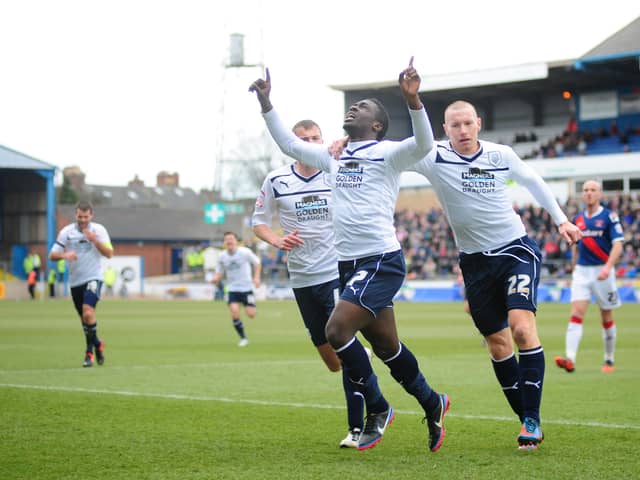 Jeffrey Monakana celebrates scoring against Carlisle in April 2013