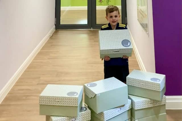 Noah delivering Rory's Boxes to Derian House