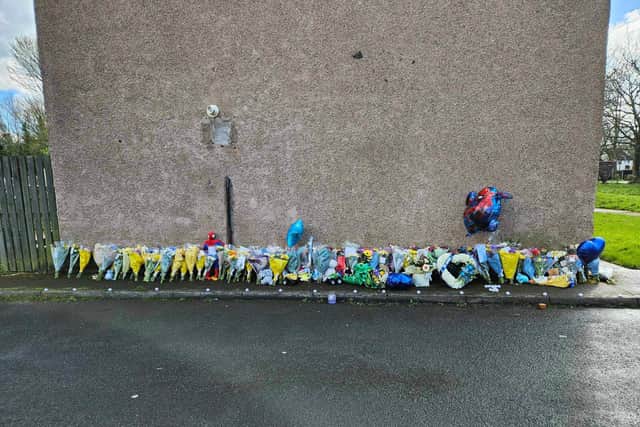 Floral tributes to Jayden Kearns in New Rough Hey