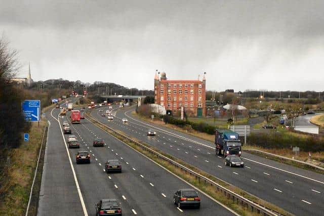 There are delays on the M61 towards Manchester after a car fire this morning