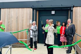 The ribbon being cut for the Gregson Lane Community Centre opening.