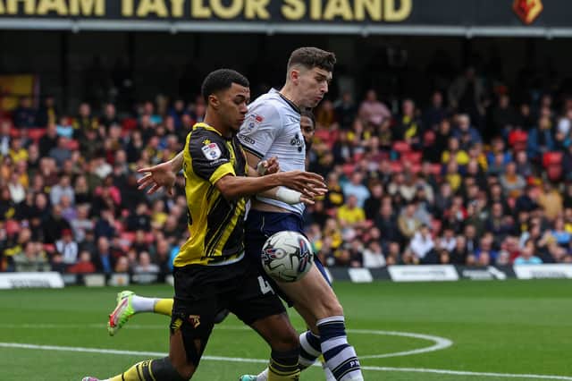 Preston North End's Jordan Storey vies for possession with Watford's Ryan Andrews