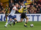Watford's Giorgi Chakvetadze holds off the challenge from Preston North End's Jack Whatmough