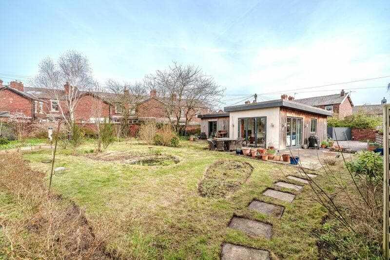 I toured a detached bungalow with lovely wraparound garden and modern design for sale