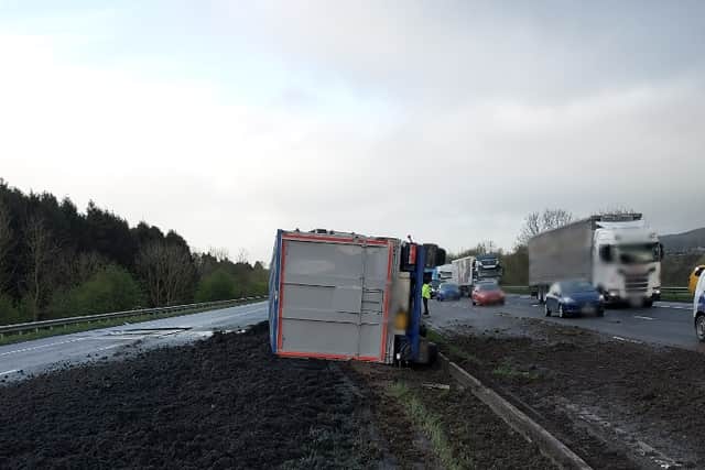 A lorry heading southbound overturned at around 9am and crashed through the central reservation barrier onto the northbound carriageway.