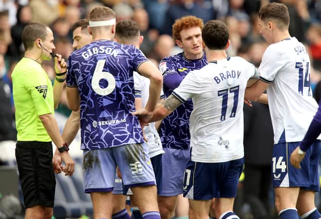 Robbie Brady and Josh Sargent face off