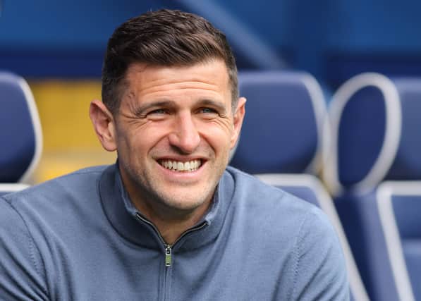 John Mousinho is the head coach at Portsmouth. He is on his way back to the Championship