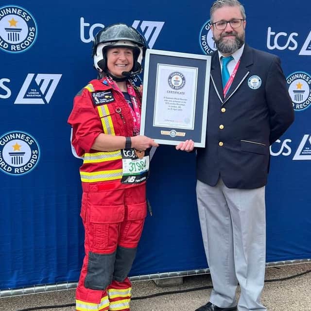 After months of training, Caroline crossed the finish line on The Mall in London and was presented with her Guinness World Record certificate and medal.
