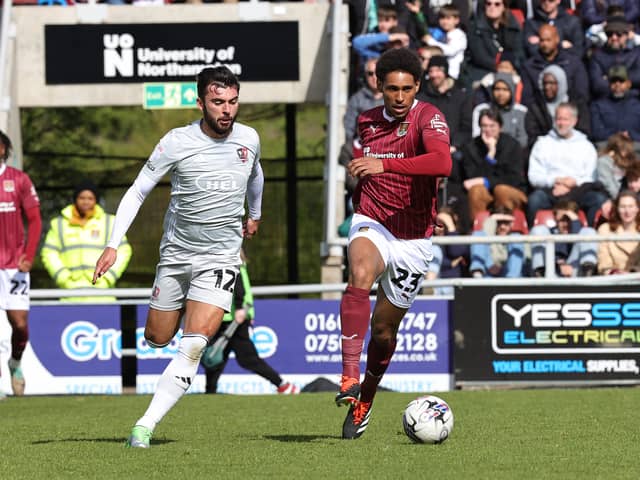 Reece Cole (L) playing for his current club Exeter City. He is reportedly wanted by three clubs for transfer. (Photo by Pete Norton/Getty Images)