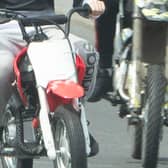 The court was told that two teenagers, aged 16 and 17, were out riding their scrambler bikes around the streets of South Shore, Blackpool in March 2022 when they became aware of a black car following them. (Stock picture for illustrative purposes only)