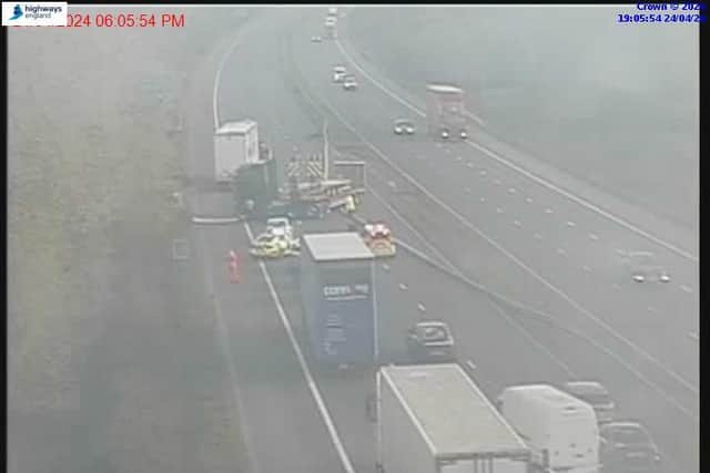 The M6 was closed near Lancaster after a lorry crashed through the central reservation (Credit: National Highways)