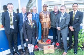  Tommy with John Winders (next to Tommy). Also gardener Chris Farron (second left) Principal Matt Eastham (third left), Lead Teacher for History Alistair Eccles (second right) and Priory's Head Prefects.

