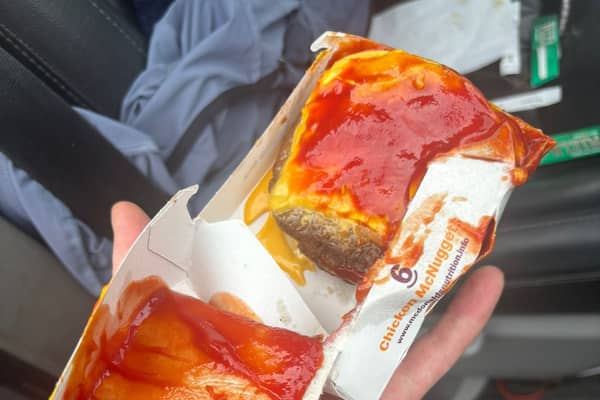 Lucie's ketchup-smeared and bun-less triple cheeseburger from McDonald's at Squires Gate, Blackpool